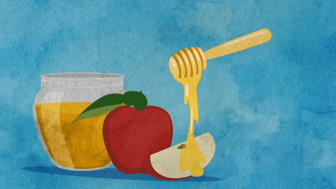 ¿Por qué mojamos la manzana en miel en Rosh Hashaná?